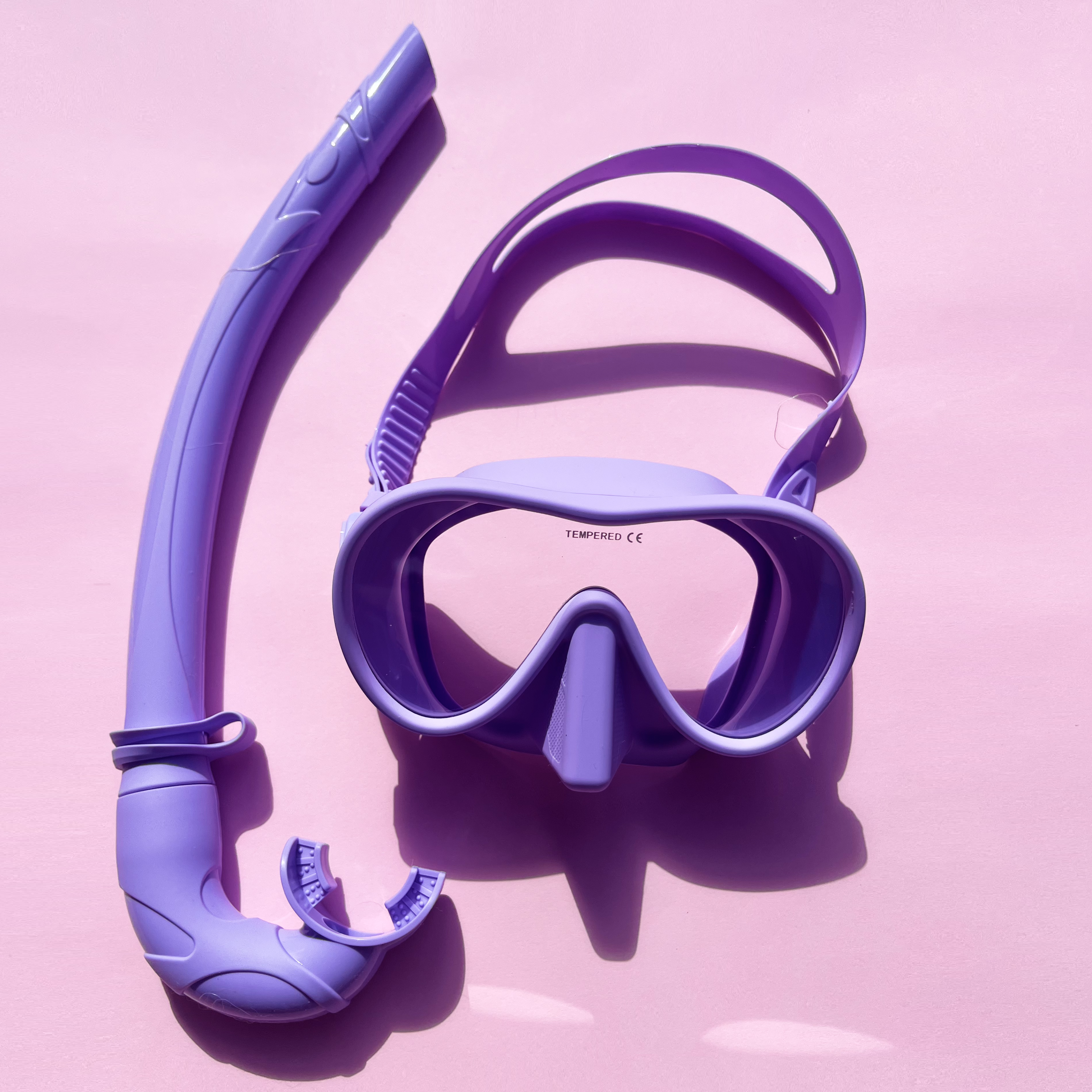Purple diving mask and snorkel set