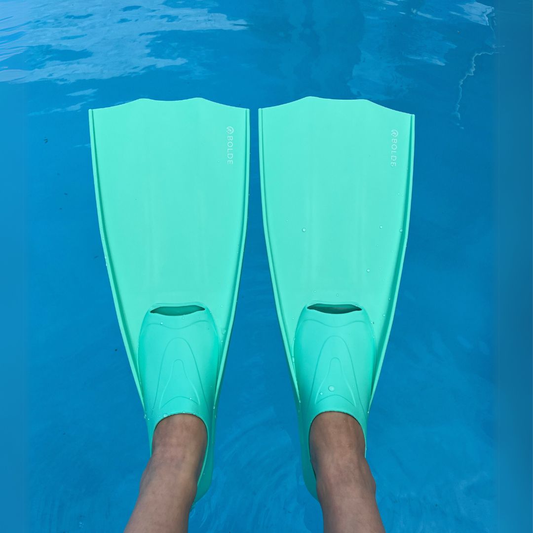 green turquoise dive and snorkel fins