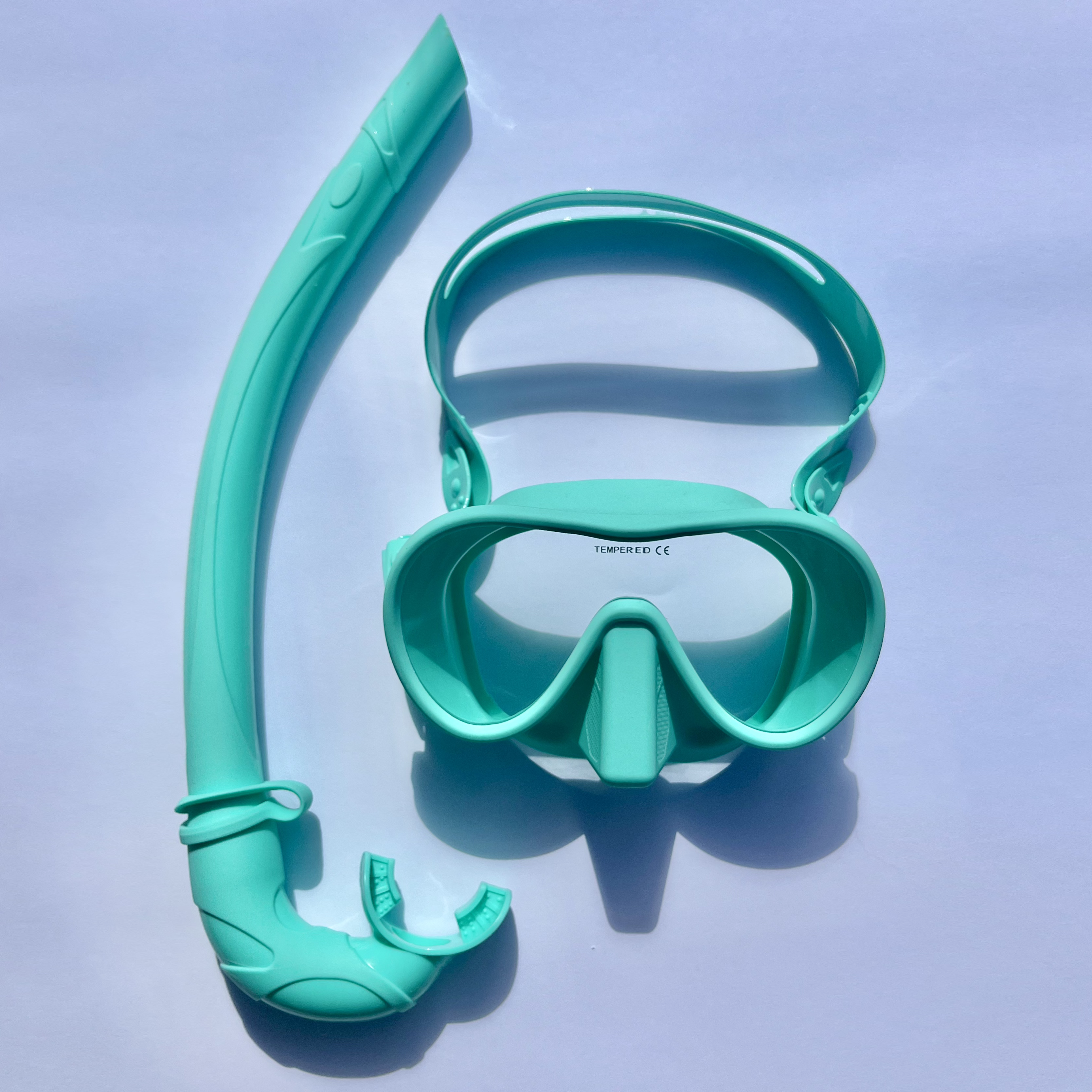 Turquoise diving mask and snorkel set