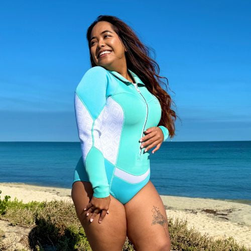 A model wearing a BOLDE Turtle women's spring suit in turquoise colour