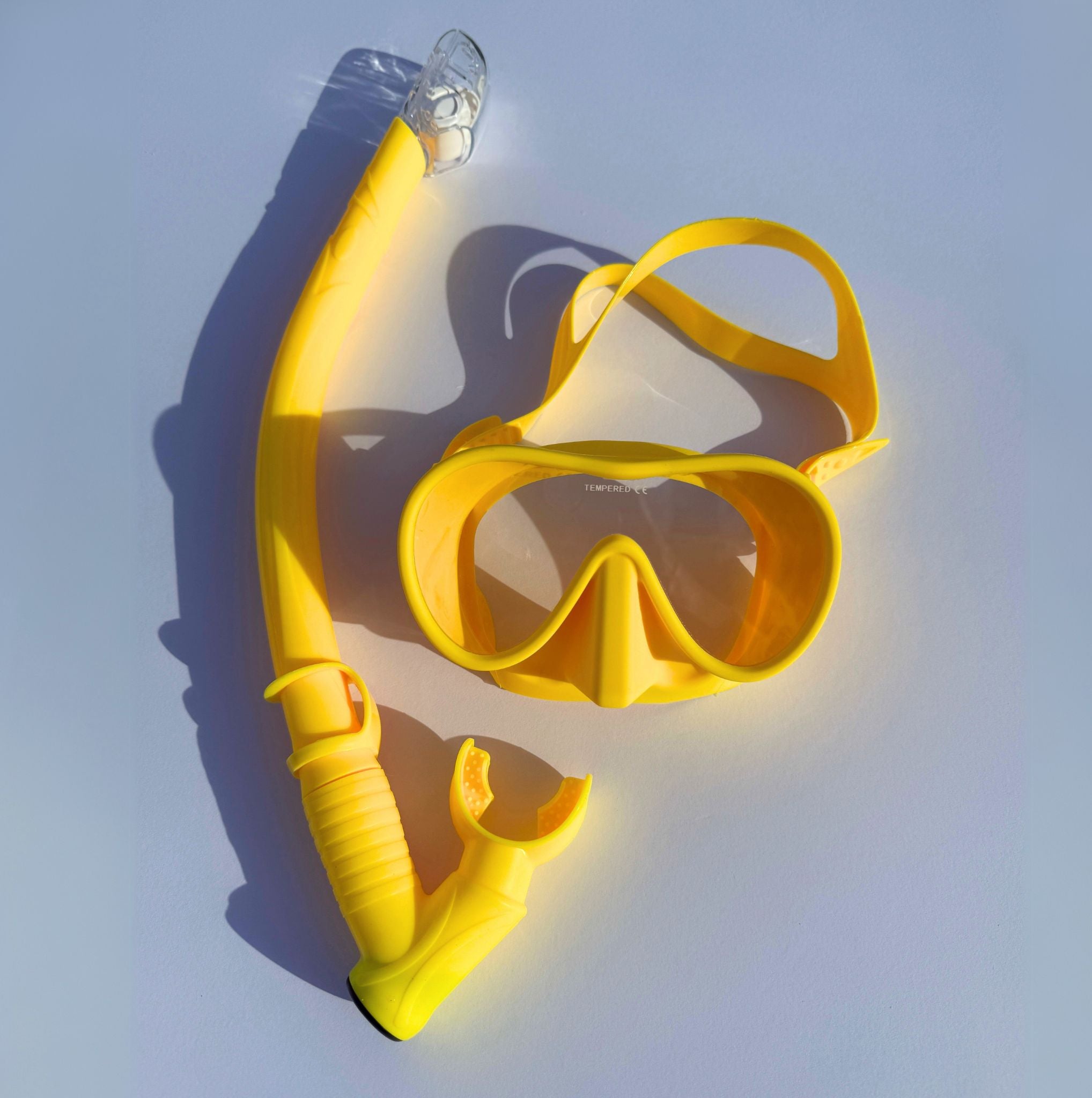 yellow diving mask and snorkel set