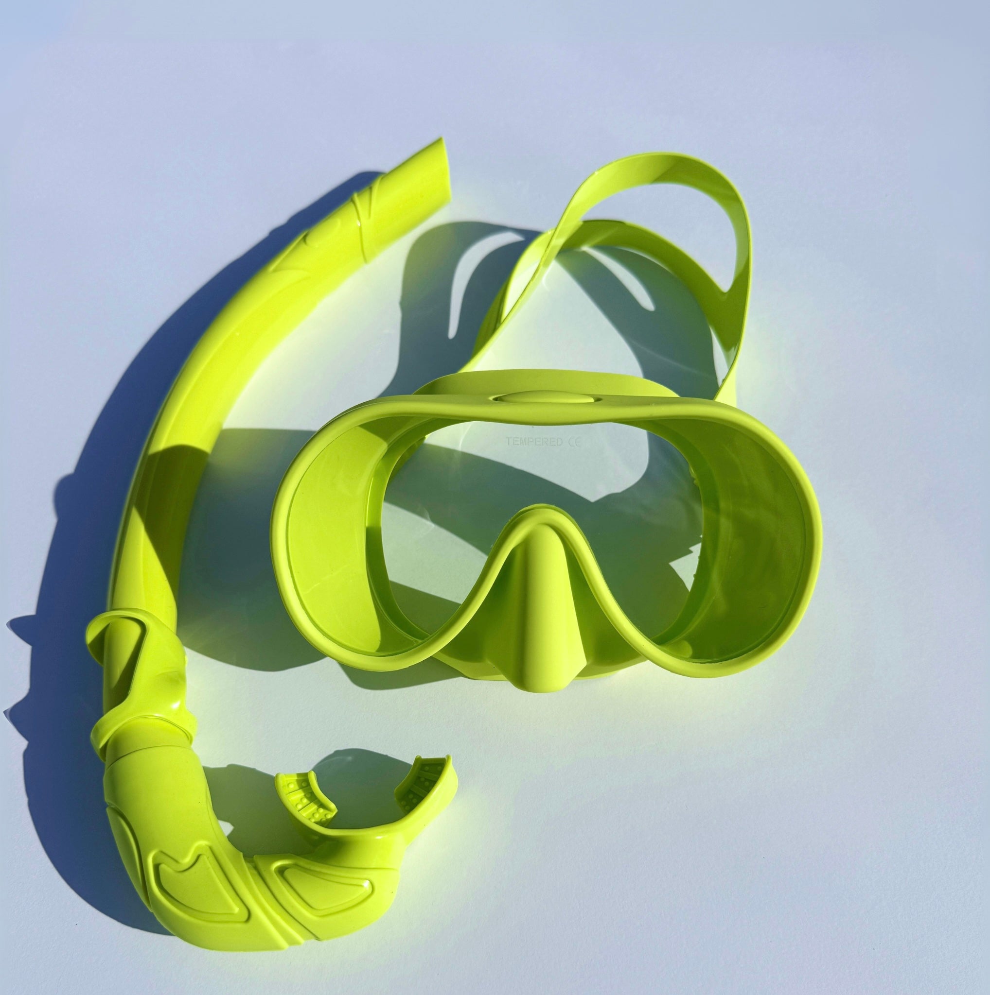 green mask and snorkel mask dive